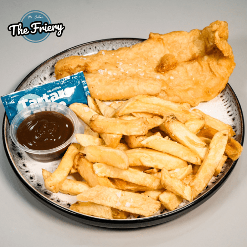 Crispy Fish & Chips Served with Sauce at The Friery Fish & Chips Takeaway in Edinburgh!